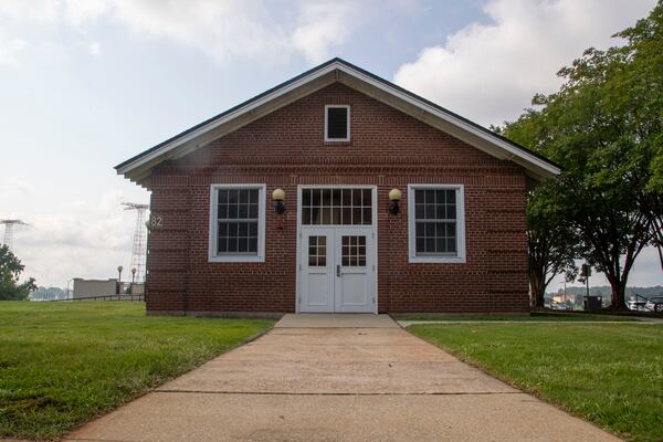 08/03/2021 —Fort Benning, Georgia — The exterior of Wigle Hall at Fort Benning, Tuesday, August 3, 2021. Pvt. Felix Hall, a Black soldier who was lynched at the base in 1941, was said to be headed to this building the day he was killed. It was once a store where African American soldiers could get food, when the base was segregated. (Alyssa Pointer/Atlanta Journal Constitution)