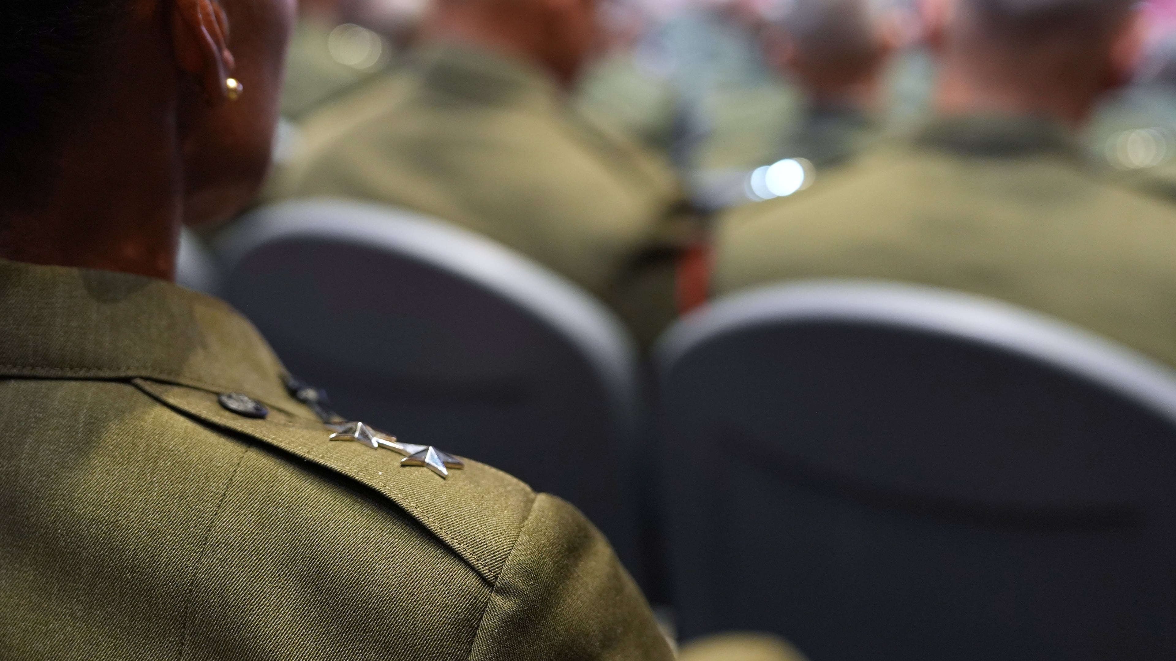 U.S. military senior leadership listen as President Donald Trump speaks at Marine Corps Base Quantico, Tuesday, Sept. 30, 2025 in Quantico, Va. (AP Photo/Evan Vucci)