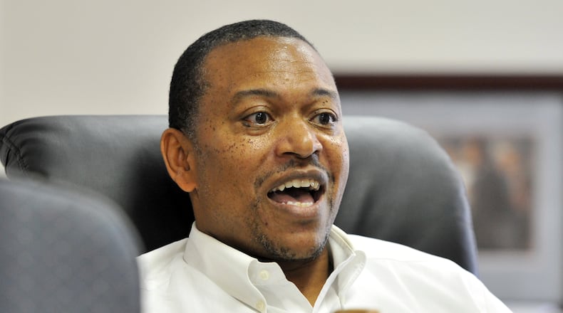 Minority engagement director Leo Smith speaks at Georgia Republican Party headquarters in Atlanta in this file photo from 2014. Hyosub Shin, hshin@ajc.com