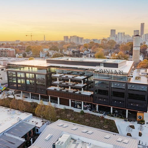 Rivian announced it will establish an East Coast headquarters at Junction Krog District in Atlanta. The photo shows the building with a rendering of Rivian's logo on the facade. (Courtesy of Rivian)