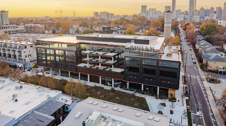 Rivian announced it will establish an East Coast headquarters at Junction Krog District in Atlanta. The photo shows the building with a rendering of Rivian's logo on the facade. (Courtesy of Rivian)