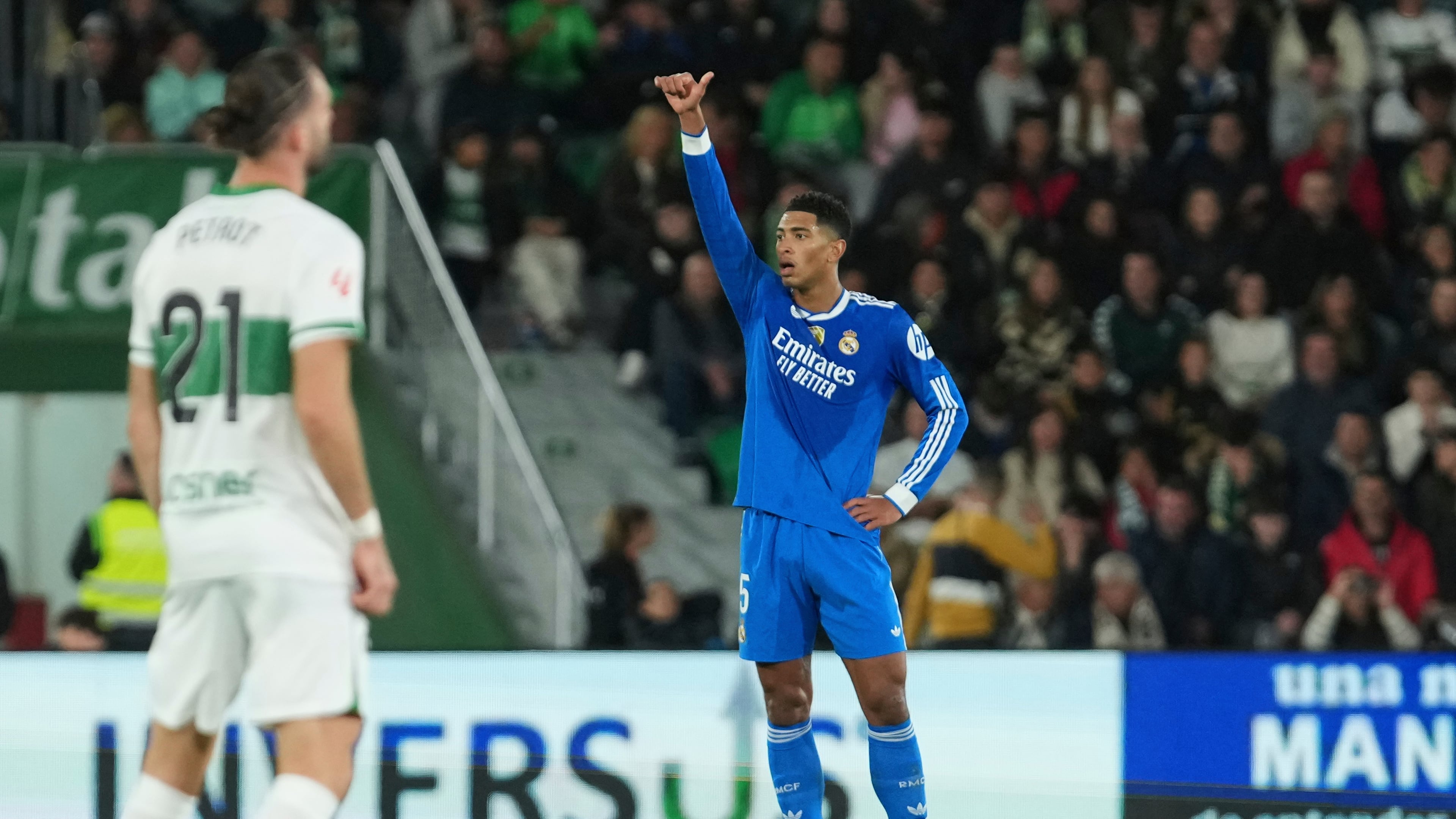 Real Madrid's Jude Bellingham celebrates after scoring his side's second goal during the Spanish La Liga soccer match between Elche and Real Madrid in Elche, Spain, Sunday, Nov. 23, 2025. (AP Photo/Alberto Saiz)