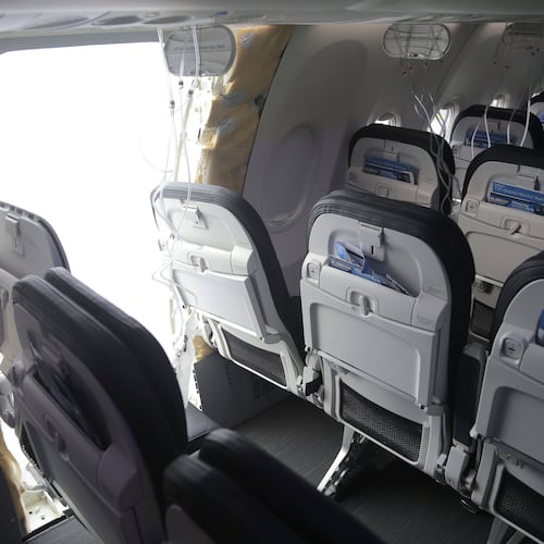 FILE - This image taken Sunday, Jan. 7, 2024, and released by the National Transportation Safety Board, shows the section of a a Boeing 737 Max where a door plug fell while Alaska Airlines Flight 1282 was in flight. (NTSB via AP, File)