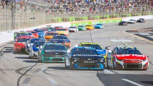Drivers Tyler Reddick (45) and William Byron (24), Raptor Chevrolet, run during the NASCAR Autotrader 400 at EchoPark Speedway on Sunday, Feb. 22, 2026, in Hampton, Ga. (Miguel Martinez/AJC)