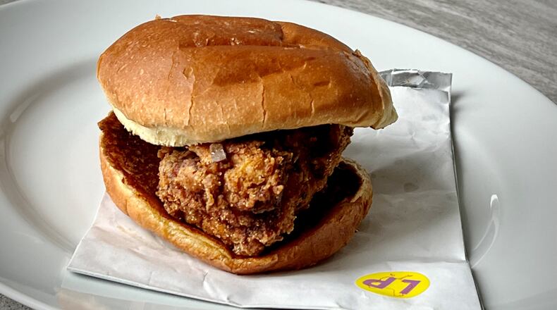 Farm Birds, a ghost kitchen run by Farm Burger, offers a lemon pepper wet chicken sandwich. Henri Hollis/henri.hollis@ajc.com