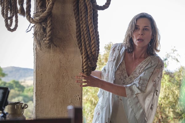 This image released by Sony Pictures Classics shows Embeth Davidtz in a scene from "Don’t Let’s Go to the Dogs Tonight." (Coco Van Oppens/Sony Pictures Classics via AP)