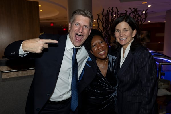 Join “Politically Georgia” co-hosts Greg Bluestein (from left), Tia Mitchell and Patricia Murphy at Manuel’s Tavern on Friday. (Nathan Posner for the AJC)