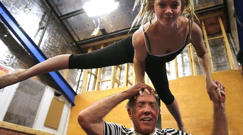 Acrobat Steve Seaberg, 85, practices a routine with the much younger Nova Hawkins, 24, for some upcoming events with the Imperial OPA Circus at Buck’s Sport Barn on May 17, 2016, in Atlanta. CURTIS COMPTON / CCOMPTON@AJC.COM
