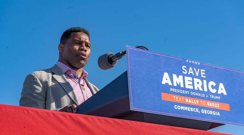 Republican candidate for U.S. Senate Herschel Walker speaks to supporters of former President Donald Trump during a rally at the Banks County Dragway on March 26, 2022, in Commerce, Georgia. (Megan Varner/Getty Images/TNS)