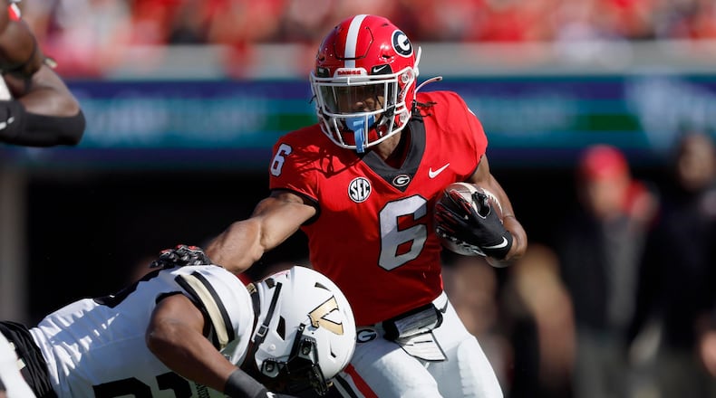 Georgia senior running back Kenny McIntosh’s roots lie in Florida, but he’ll look to defeat the Gators in their yearly matchup in Jacksonville. (Jason Getz/Atlanta Journal-Constitution/TNS)