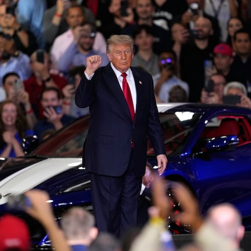 President Donald Trump arrives to speak at an event at the General Motors Proving Ground Monday, July 27, 2026, in Milford, Mich. (AP Photo/Paul Sancya)