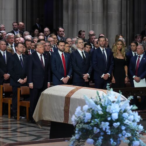 President Donald Trump, Vice President JD Vance and other guests, attend the funeral of Sen. Lindsey Graham, R-S.C., Tuesday July 28, 2026, at the Washington National Cathedral in Washington. (AP Photo/Jacquelyn Martin)