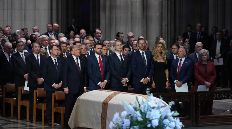 President Donald Trump, Vice President JD Vance and other guests, attend the funeral of Sen. Lindsey Graham, R-S.C., Tuesday July 28, 2026, at the Washington National Cathedral in Washington. (AP Photo/Jacquelyn Martin)