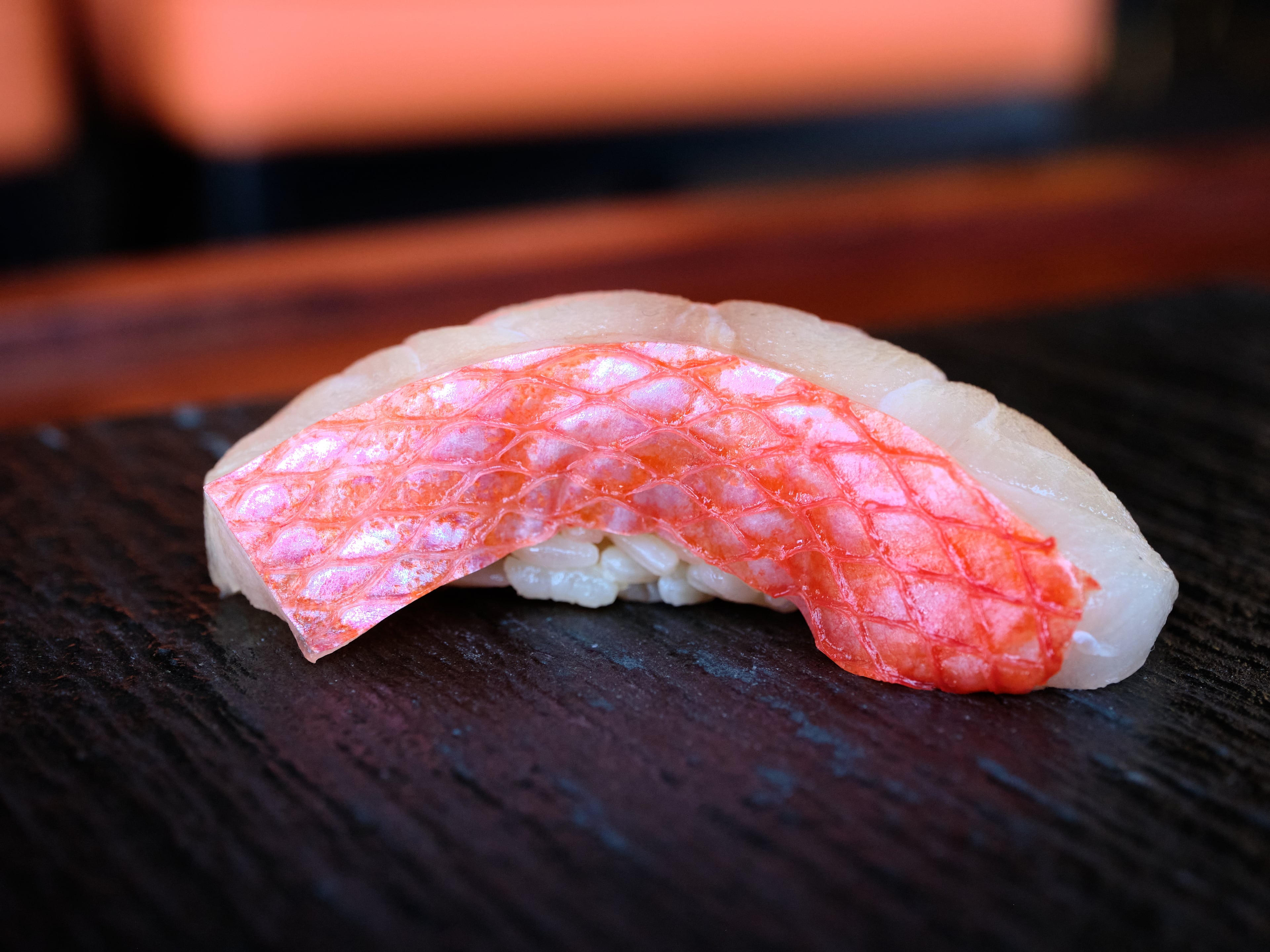 A piece of nigiri at Omakase Table in west Midtown. (Omakase Table/Brandon Amato)