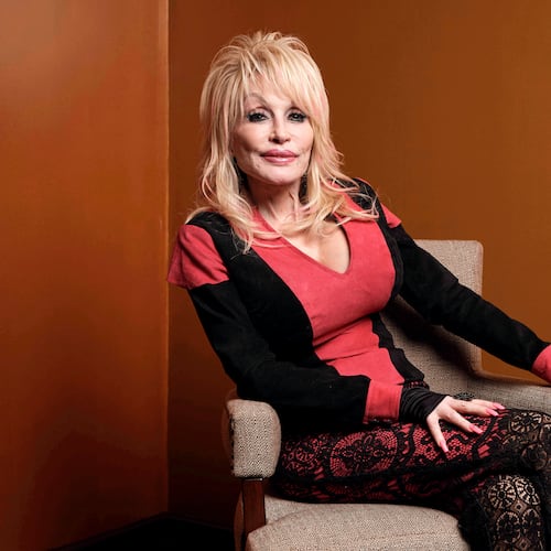 FILE - Dolly Parton poses at the Carnegie Medal of Philanthropy Ceremony in New York, on Oct. 13, 2022. (AP Photo/Andres Kudacki, File)