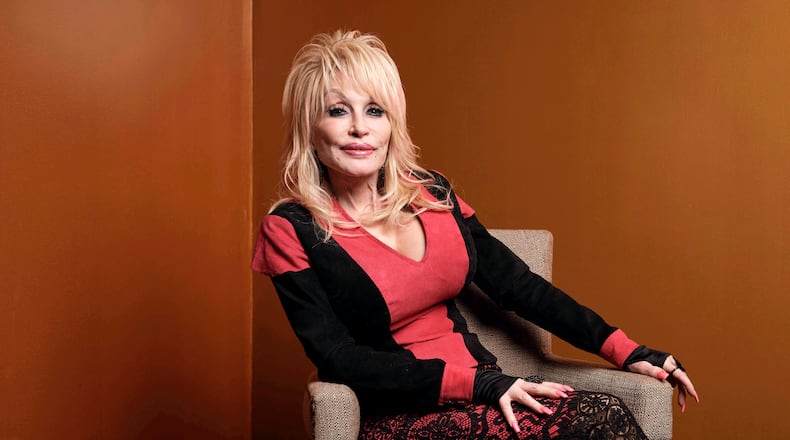 FILE - Dolly Parton poses at the Carnegie Medal of Philanthropy Ceremony in New York, on Oct. 13, 2022. (AP Photo/Andres Kudacki, File)