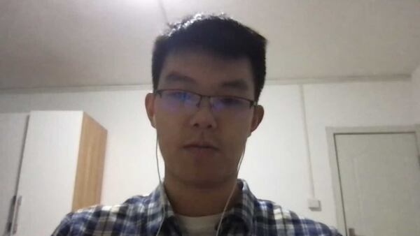 Emory University senior Joey Ye has been taking courses virtually from his hometown, Chongqing, China, since the coronavirus pandemic started taking hold in Georgia in March 2020. Here, Ye speaks during a Zoom interview in March 2021 to The Atlanta Journal-Constitution, despite a 13-hour time difference. (Image via Zoom)