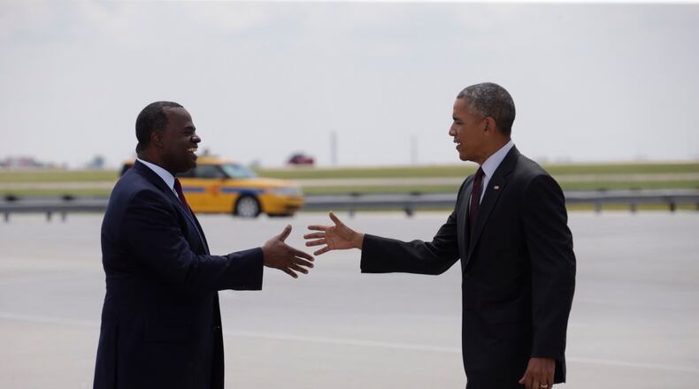 Atlanta Mayor Kasim Reed greets President Barack Obama after Air Force One landed in Atlanta on Aug. 1, 2016. (Bob Andres, bandres@ajc.com)