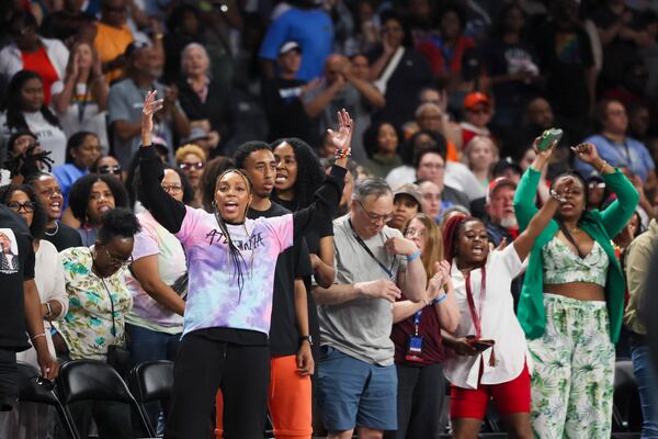 Atlanta Dream fans cheer during the Dream game against the Minnesota Lynx in an WNBA game at the Gateway Center Arena, Friday, June 27, 2025, in College Park, Ga. (Jason Getz/AJC)