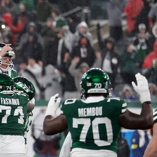 New York Jets place kicker Nick Folk (6) celebrates with teammates after he kicked the game-winning field goal against the Atlanta Falcons during the second half of an NFL football game, Sunday, Nov. 30, 2025, in East Rutherford, N.J. (AP Photo/Adam Hunger)