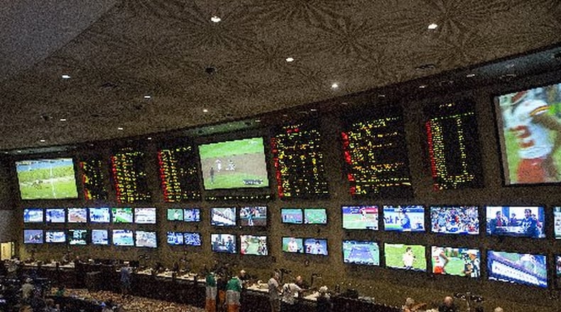 People place bets on sports at the MGM Grand Race & Sports Book in Las Vegas, Aug. 25, 2017. Supporters of gambling legislation in Georgia are trying to determine the best way forward. (Bridget Bennett/The New York Times)