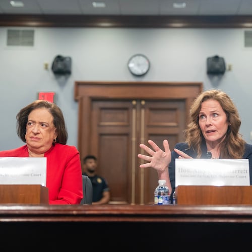 Supreme Court Justices Amy Coney Barrett, right, and Elena Kagan testify during a House Appropriations subcommittee hearing, Tuesday, July 14, 2026, on Capitol Hill in Washington. (AP Photo/Nathan Howard)