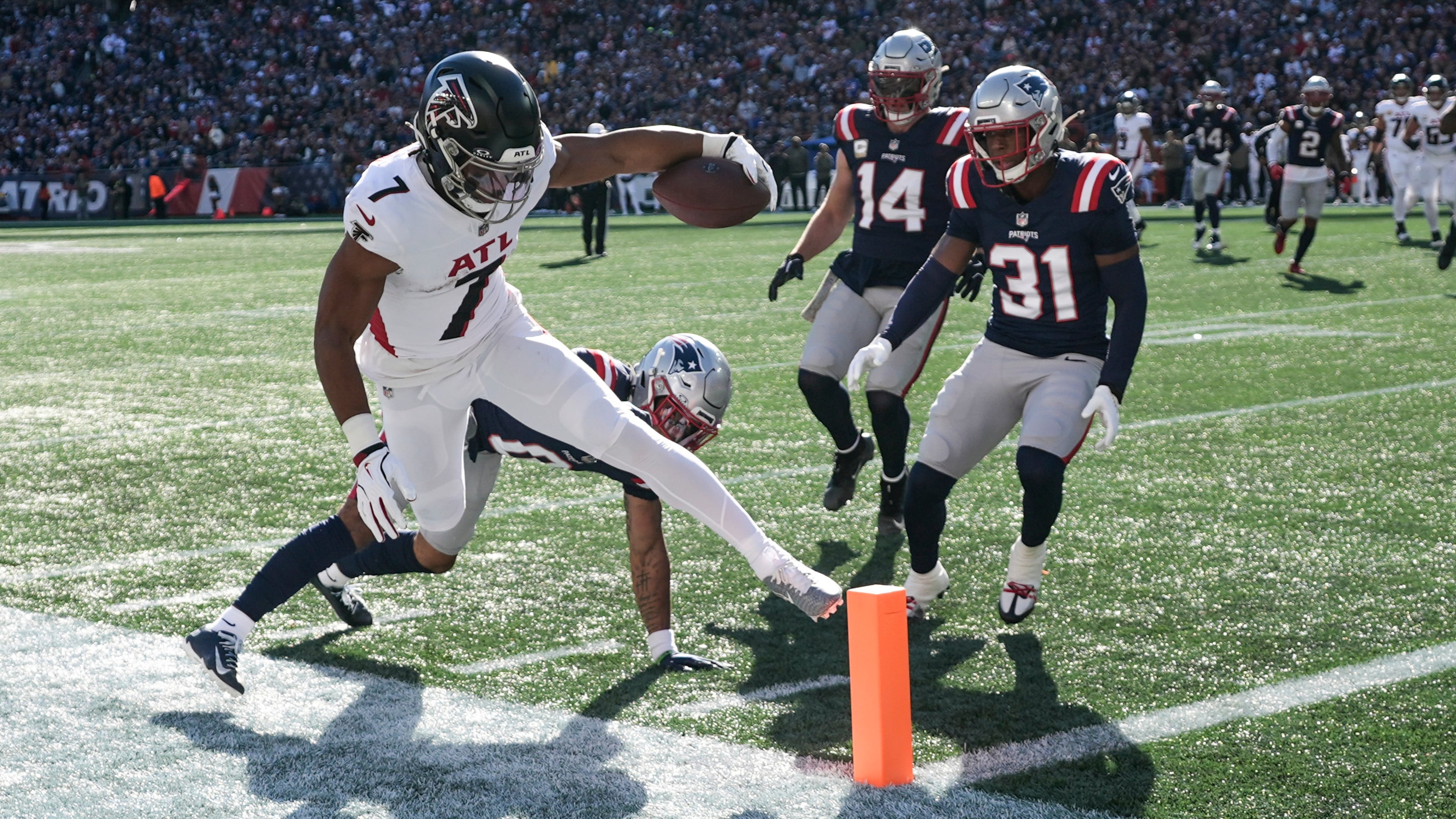 Atlanta Falcons running back Bijan Robinson (7) runs against the New England Patriots during the first half of an NFL football game, Sunday, Nov. 2, 2025, in Foxborough, Mass. (AP Photo/Charles Krupa)