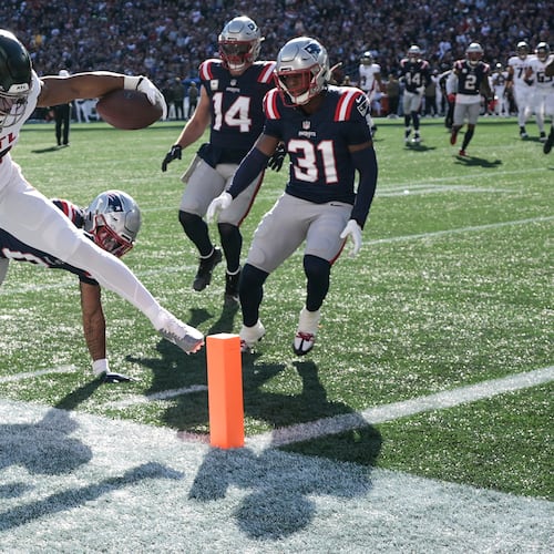 Atlanta Falcons running back Bijan Robinson (7) runs against the New England Patriots during the first half of an NFL football game, Sunday, Nov. 2, 2025, in Foxborough, Mass. (AP Photo/Charles Krupa)