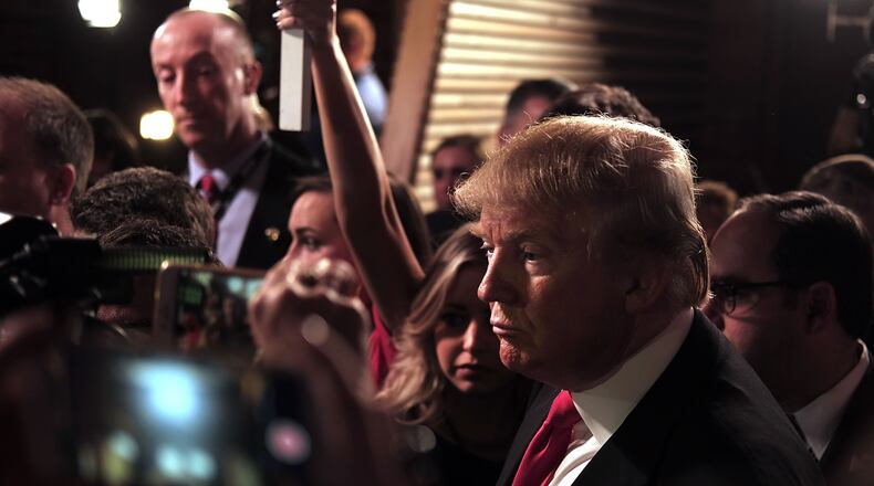 GREENVILLE, SC - FEBRUARY 13: Presidential candidate Donald Trump speaks in the "Spin Room" following the Republican Presidential debate on February 13, 2016 in Greenville, South Carolina. This evenings debate featured a lively exchange between Trump and fellow candidates Jeb Bush and Ted Cruz.The six remaining candidates will spend the week campaigning before Saturdays primary. (Photo by Spencer Platt/Getty Images)