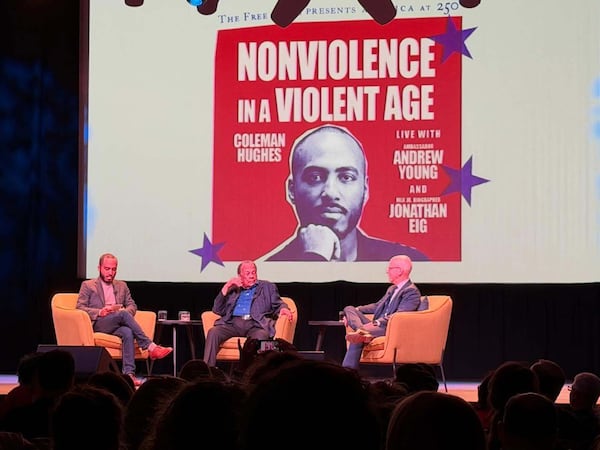 As part of its America at 250 series, The Free Press presented a live recording of Coleman Hughes' podcast, "Conversations with Coleman," at the Buckhead Theatre on Monday. Coleman (from left), interviewed former Atlanta Mayor and U.N. Ambassador Andrew Young and Pulitzer Prize winning MLK biographer Jonathan Eig on the theme of "Nonviolence in a Violent Age." (David Plazas/AJC)