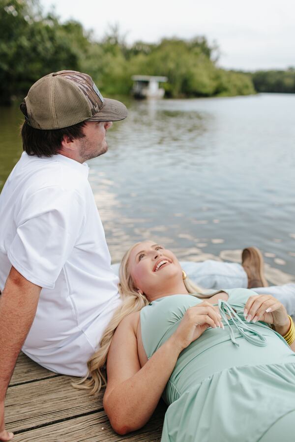 Hunter Bratcher (left) and his match share a quiet moment overlooking the water during a photo shoot, despite having met just moments before. (Courtesy of Lanie Mae Co. Photography)