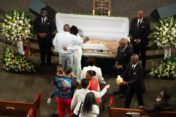Family and friends view Tianah Robinson’s body at Ebenezer Baptist Church before the start of a celebration of life Saturday, April 18, 2026, in Atlanta. Tianah was a student at North Clayton High School, where she played volleyball. (Ben Gray for the AJC)