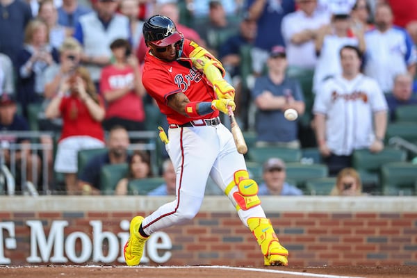Atlanta Braves' Ronald Acuna Jr. hits a home run in the first inning of a baseball game against the San Diego Padres, Friday, May 23, 2025, in Atlanta. (AP Photo/Colin Hubbard)