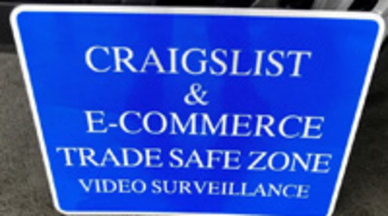 New blue signs, in well-lit places, are monitored by video surveillance at six Cobb police locations for safe places to conduct e-commerce trades and sales.