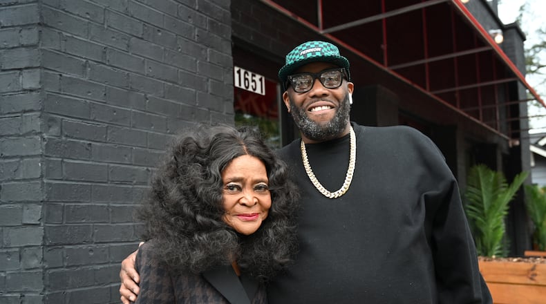 Killer Mike poses with former owner Helen Harden in advance of Bankhead Seafood's reopening last month in Atlanta. The beloved Grove Park restaurant, located at 1651 Donald Lee Hollowell Parkway, shuttered in 2018 after 50 years in operation. Westside natives Killer Mike and T.I. are reopening Bankhead Fish and Soul, also known as Bankhead Seafood. (Hyosub Shin / AJC)