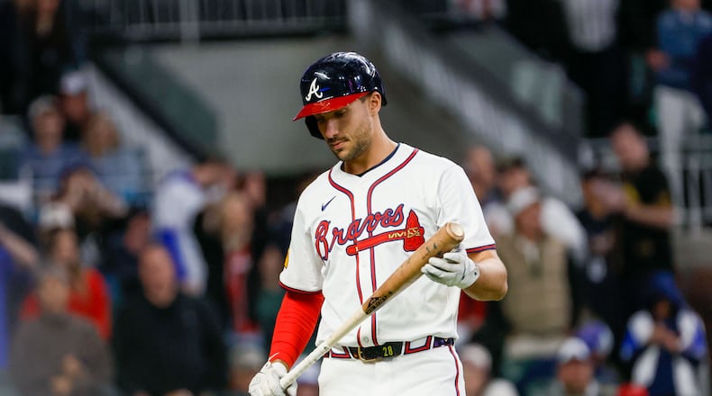 Braves first baseman Matt Olson (28) after striking out during the eighth inning against the Texas Rangers at Truist Park on Sunday, April 21, 2024. (Miguel Martinez/AJC)