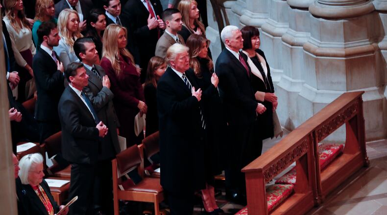 President Donald Trump and Vice President Mike Pence, along with their families, attend an interfaith prayer service at the Washington National Cathedral in Washington, Jan. 21, 2017. (Doug Mills/The New York Times)