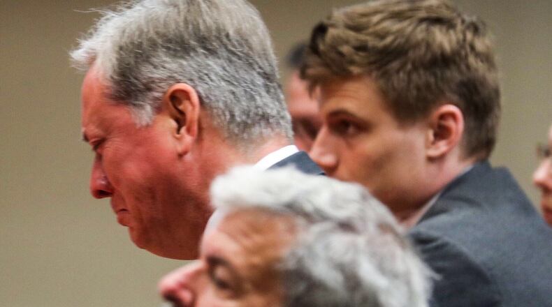 Former DeKalb County Police Officer Robert "Chip" Olsen reacts as he is is sentenced to 12 years behind bars for killing Anthony Hill in 2015. AJC/ALYSSA POINTER
