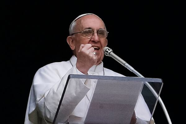 FILE - Pope Francis gestures as he delivers his Angelus prayer from the window of his studio overlooking St. Peter's Square, at the Vatican, Sunday, March 17, 2013. “In these days I’ve been able to read a book by a cardinal -- Cardinal Kasper, a good theologian -- about mercy. And this book has done me a lot of good, though don’t think I’m just doing publicity for my cardinals’ books! It’s not like that. But it’s done me so much good. Cardinal Kasper said that feeling mercy, this word changes everything. It’s the best thing we can feel: It changes the world. A bit of mercy makes the world less cold and more just.” (AP Photo/Gregorio Borgia, File)