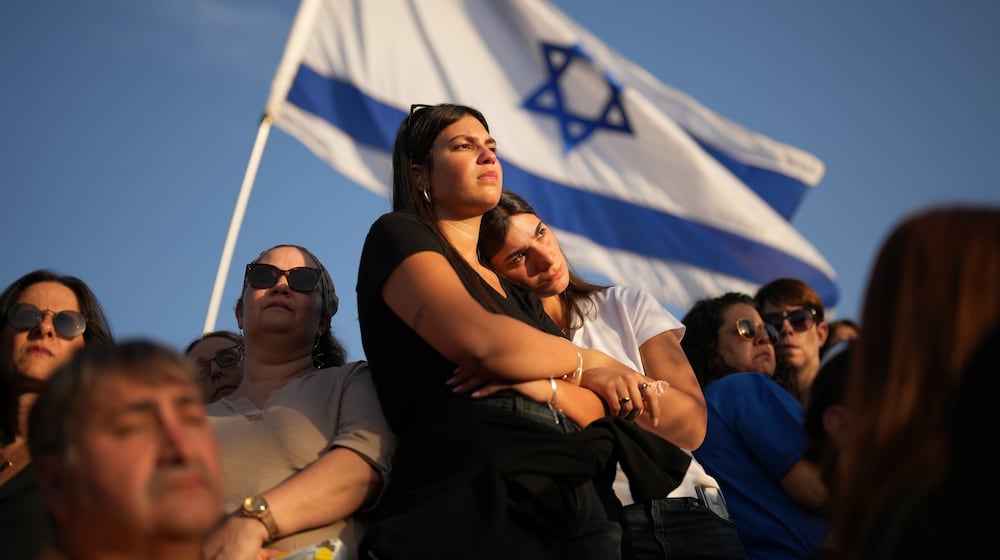 Relatives and friends mourn during the funeral of an Israeli soldier killed last week in Gaza. (Francisco Seco/AP)