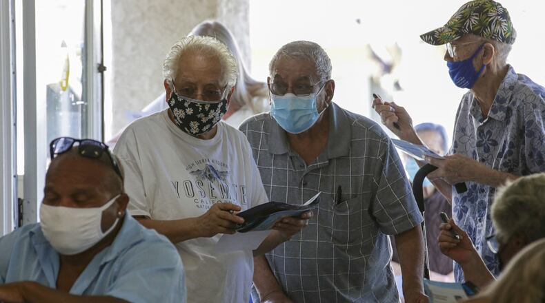 L.A. County Department of Public Health holds coronavirus vaccination facility for seniors at Whispering Fountains Senior Living Community on Wednesday, March 31, 2021 in Lakewood, Calif. (Irfan Khan/Los Angeles Times/TNS)