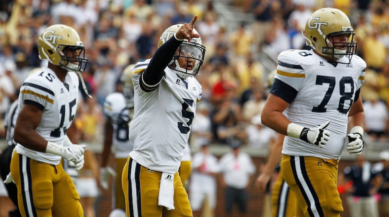 Georgia Tech quarterback Justin Thomas (5) celebrates his touchdown against the Georgia Southern during the first half of an NCAA football game, Saturday, Sept. 13, 2014, in Atlanta. (AP Photo/Mike Stewart) Justin Thomas had three touchdown passes and ran for a fourth in the first half. (AP photo)