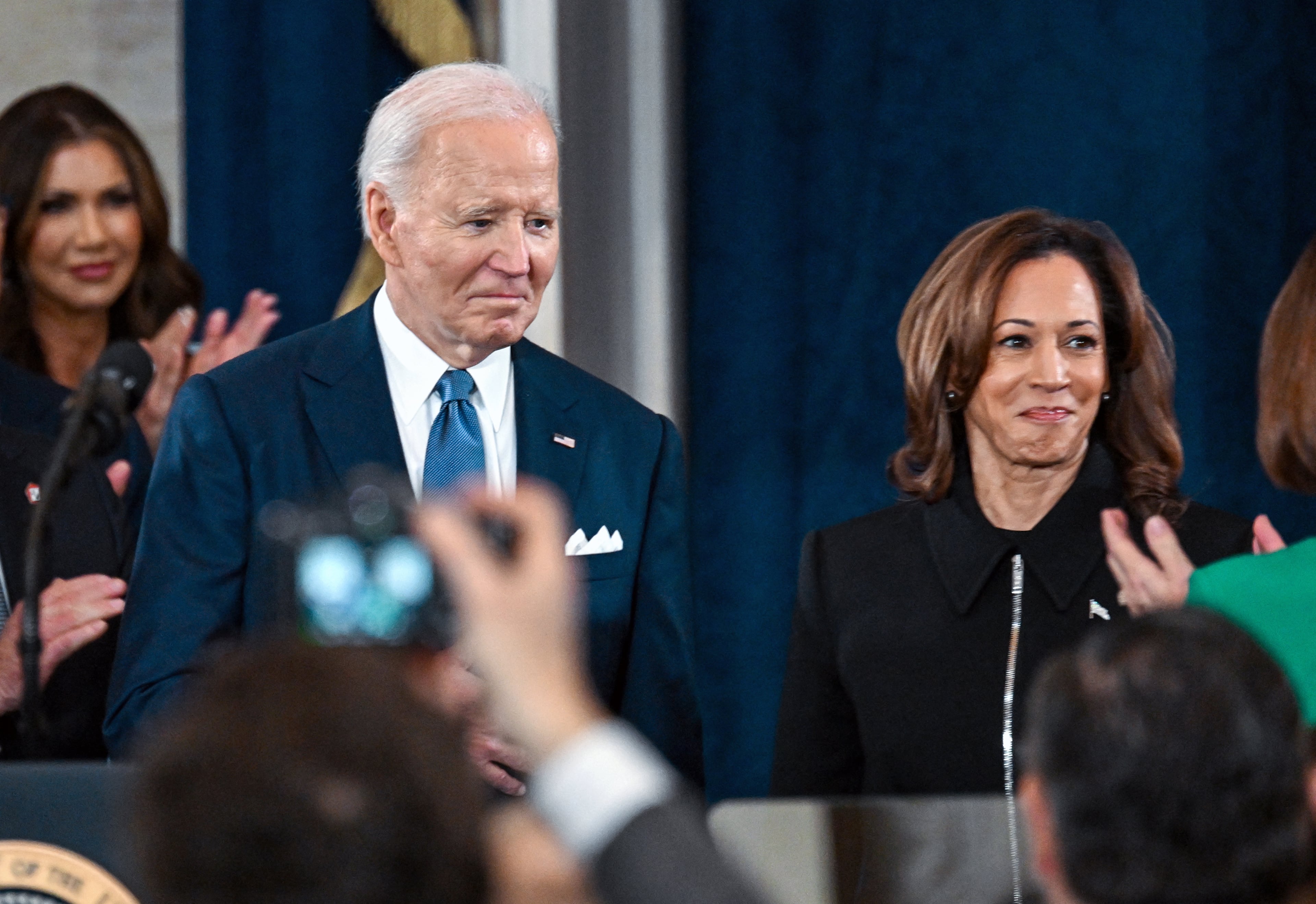 President Joe Biden and Vice President Kamala Harris arrive for the inauguration of Donald Trump as the 47th U.S. president inside the Capitol Rotunda of the U.S. Capitol on Jan. 20. (Kenny Holston/Pool/AFP/Getty Images/TNS)