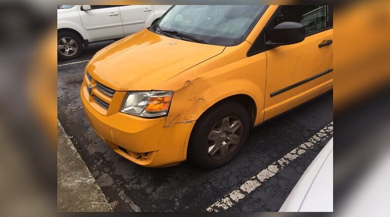 Police are investigating after a taxi hit a bicyclist in DeKalb County.