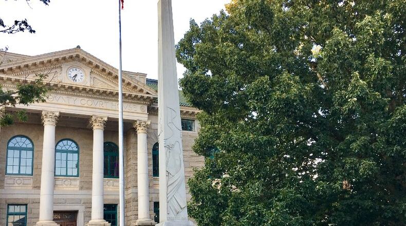 Several generations of children have played on and around Decatur’s Civil War monument, erected in 1908. During Monday night’s commission meeting one resident called it, “A lightning rod of hate and divisiveness with a legacy of domination.” Bill Banks for the AJC