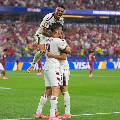 Spain's Pedro Porro, top, congrats Spain's Mikel Merino, right, after scored during the World Cup round of 16 soccer match between Portugal and Spain in Arlington, Texas, near Dallas, Monday, July 6, 2026. (AP Photo/Julio Cortez)