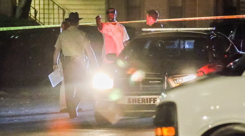 Douglas County deputies investigate a fatal shooting near Austell on Thurs., Oct. 8, 2015. JOHN SPINK / JSPINK@AJC.COM