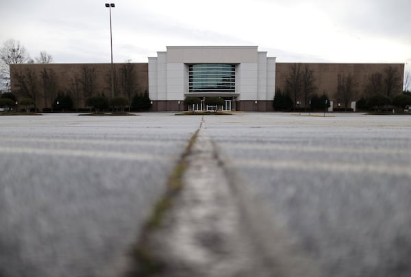 Thousands of empty parking spaces surround Gwinnett Place. The Duluth mall that has seen a sharp decline in shoppers and retailers. Ben Gray / bgray@ajc.com