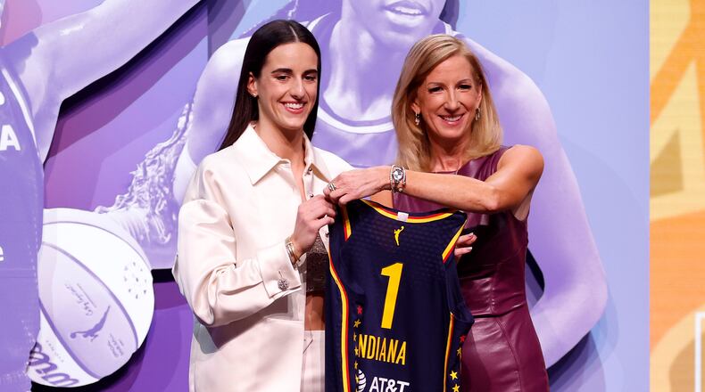 Caitlin Clark (left) poses with WNBA Commissioner Cathy Engelbert after being selected as the first overall pick by the Indiana Fever during the 2024 WNBA draft at Brooklyn Academy of Music on Monday, April 15, 2024, in New York City. (Sarah Stier/Getty Images/TNS)