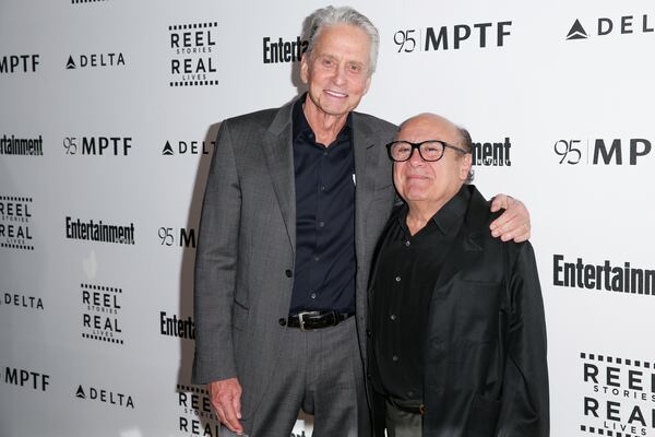 FILE - Michael Douglas, left, and Danny DeVito appear at the 5th Annual Reel Stories, Real Lives Benefit on April 7, 2016, in Los Angeles. (Photo by Rich Fury/Invision/AP, File)